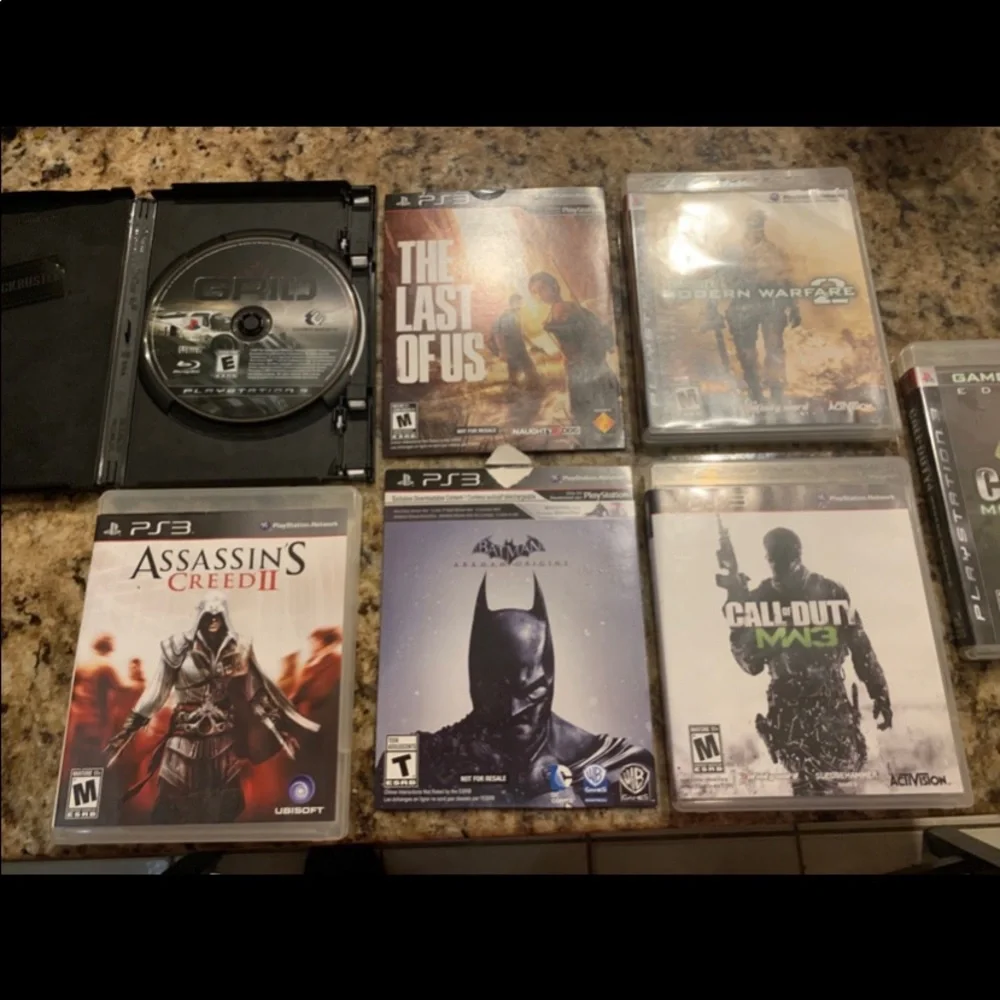 Sony PlayStation 3  Super Slim 250GB  Bundle, Model CECH 4001B + (7) Games